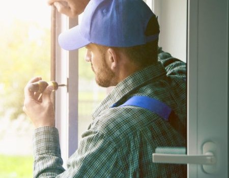 Professional installing the right window material type window for Alberta's climate